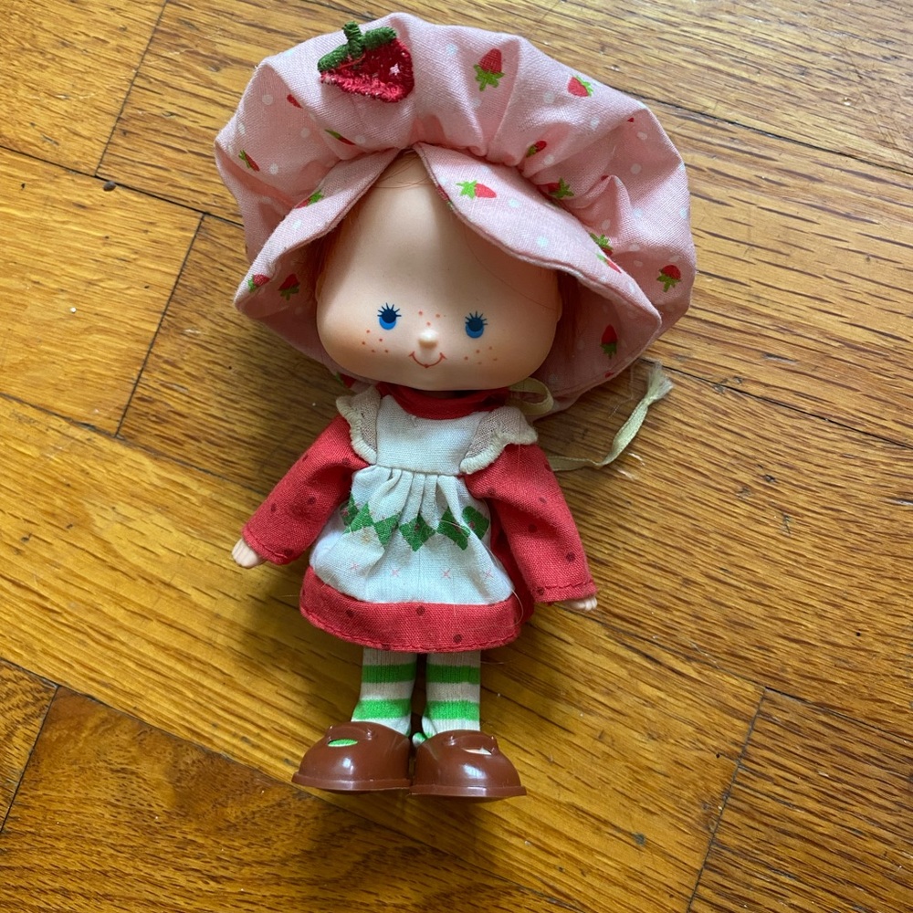 Vintage Strawberry Doll with Pink Hat and Red Dress
